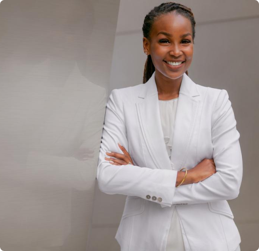 Person smiling in a virtual coaching session